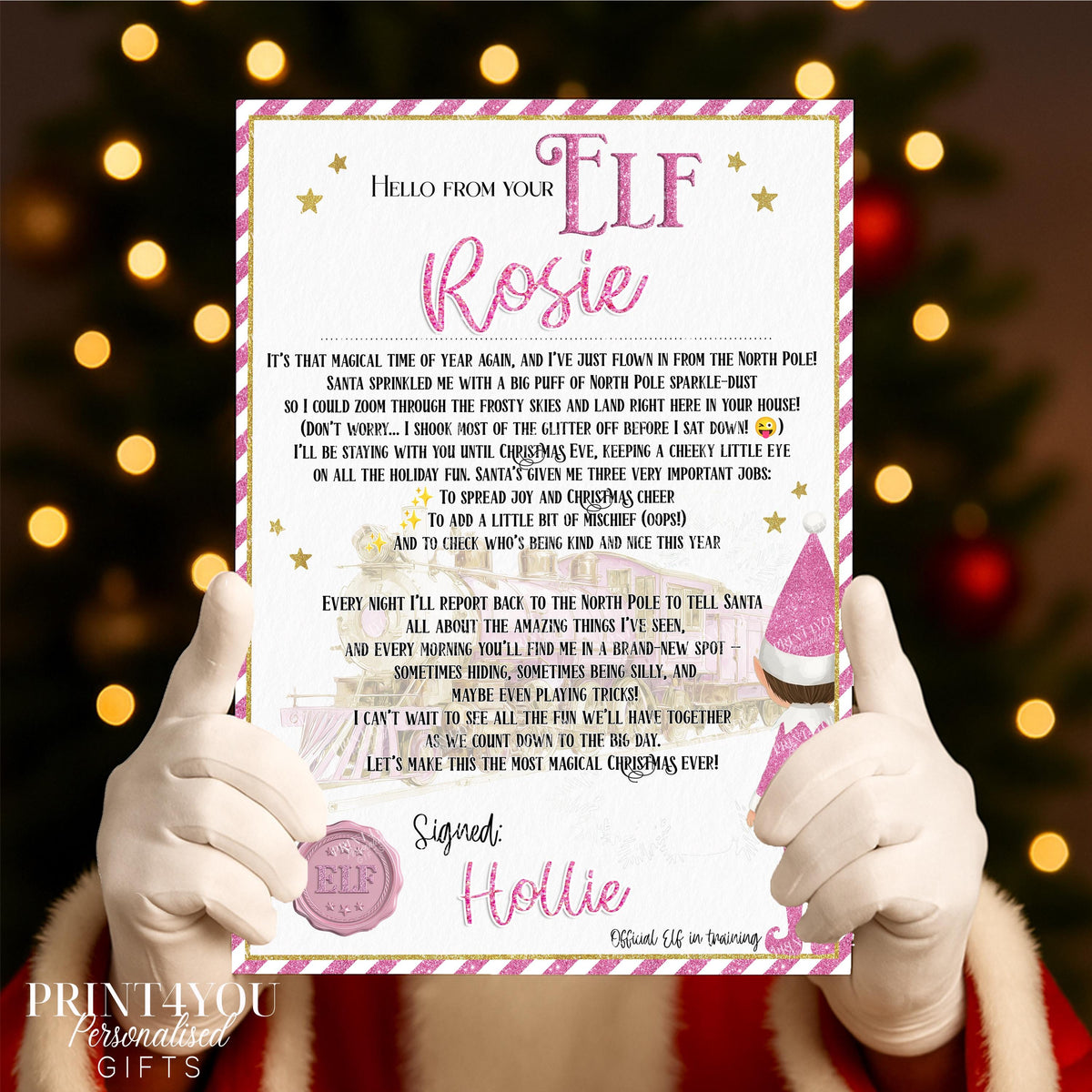 Personalised Pink Elf Arrival Letter on A4 gloss card, showing the pink elf design with stars, festive hat and a custom child's name and Elf's name