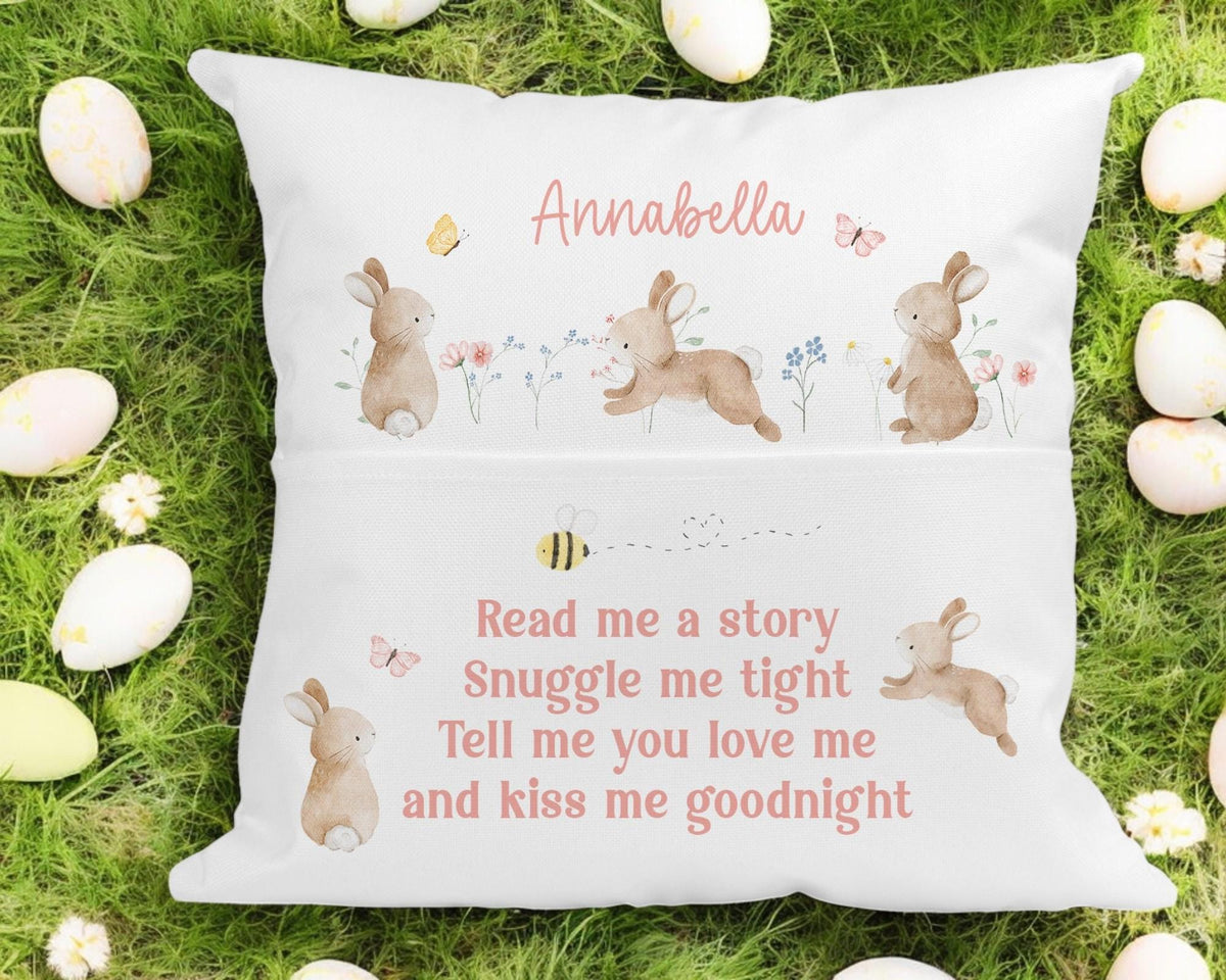 Personalised bunny book cushion with a book tucked into the front pocket, custom name Christmas gift for children