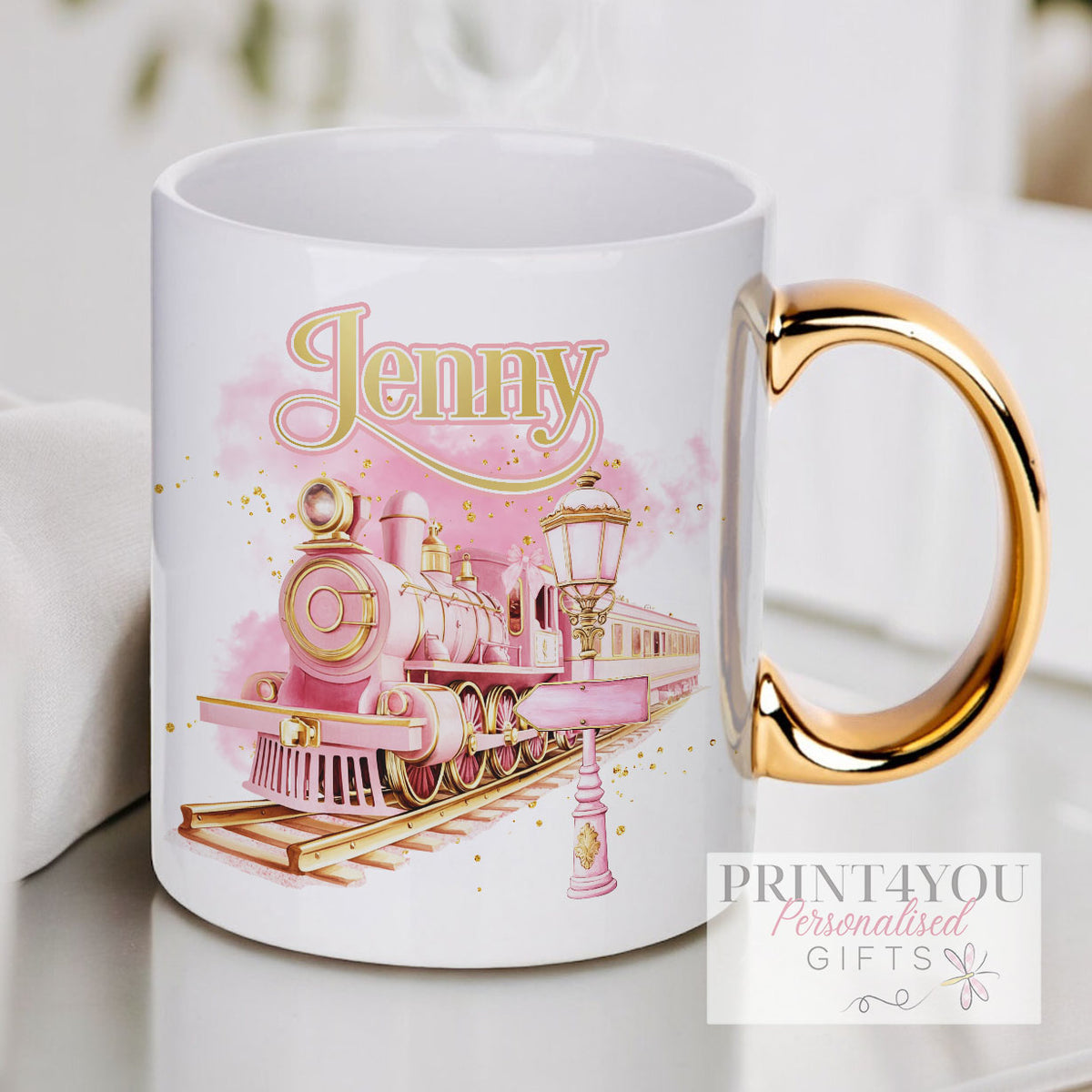 Personalised pink ceramic mug with gold handle and Christmas Express Train design, printed with a custom name