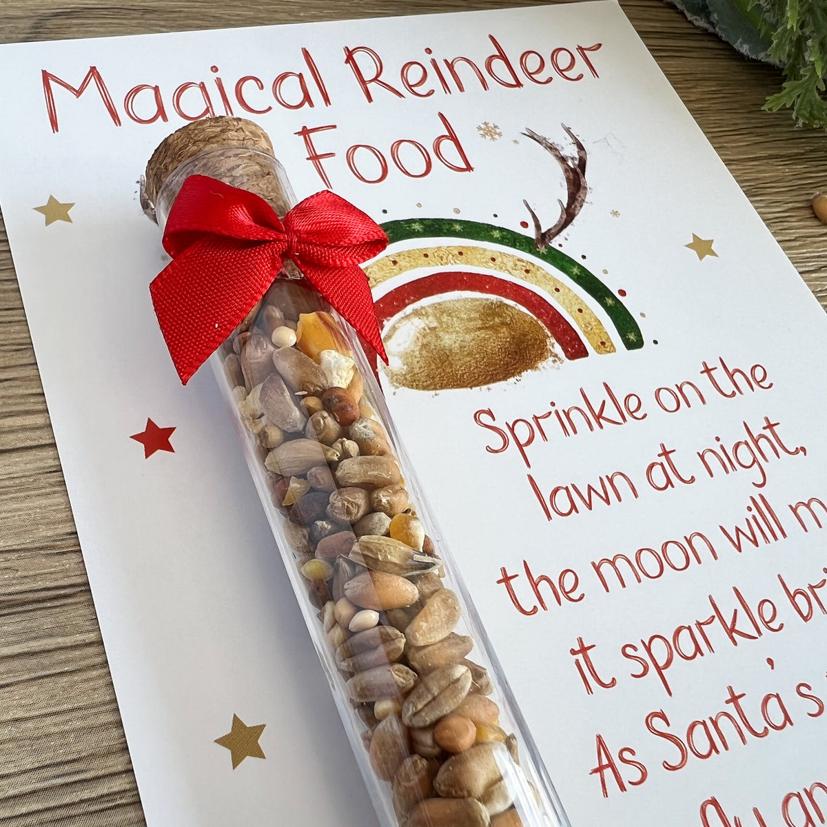 Close-up of the wildlife-friendly reindeer food mix inside its cork-stopped tube.