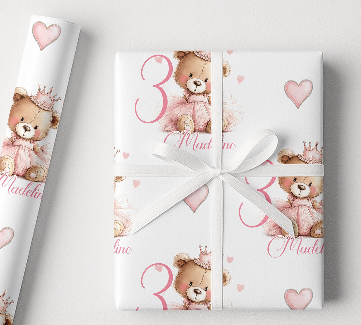 Roll of the personalised pink princess teddy bear wrapping paper packaged ready for postal delivery.
