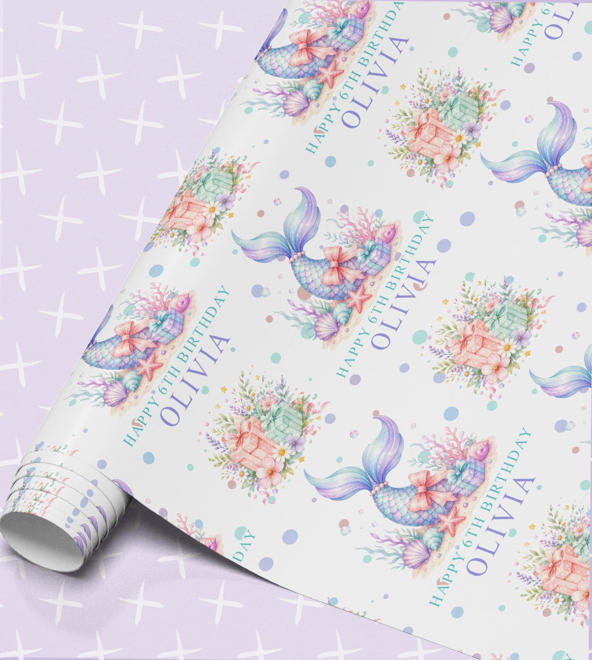 Personalised mermaid birthday wrapping paper with watercolour mermaid tails, coral, starfish and treasure chests, printed with Happy 6th Birthday and the name Olivia on a lilac sparkle background