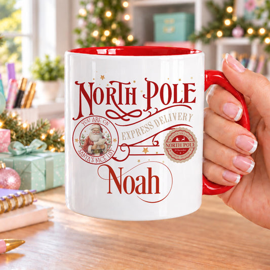 Personalised Christmas mug with red handle and inside, printed with vintage North Pole Express Delivery lettering, a Santa stamp and North Pole postmark, with a name in red