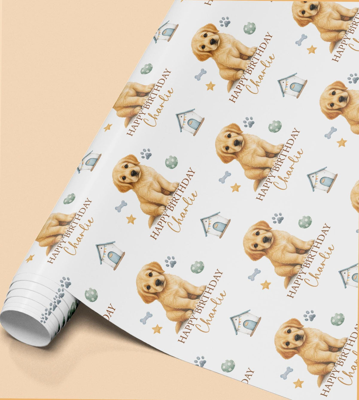 Sheet of personalised Golden Retriever birthday wrapping paper, showing a puppy illustration with a custom name, paw prints and dog toys.