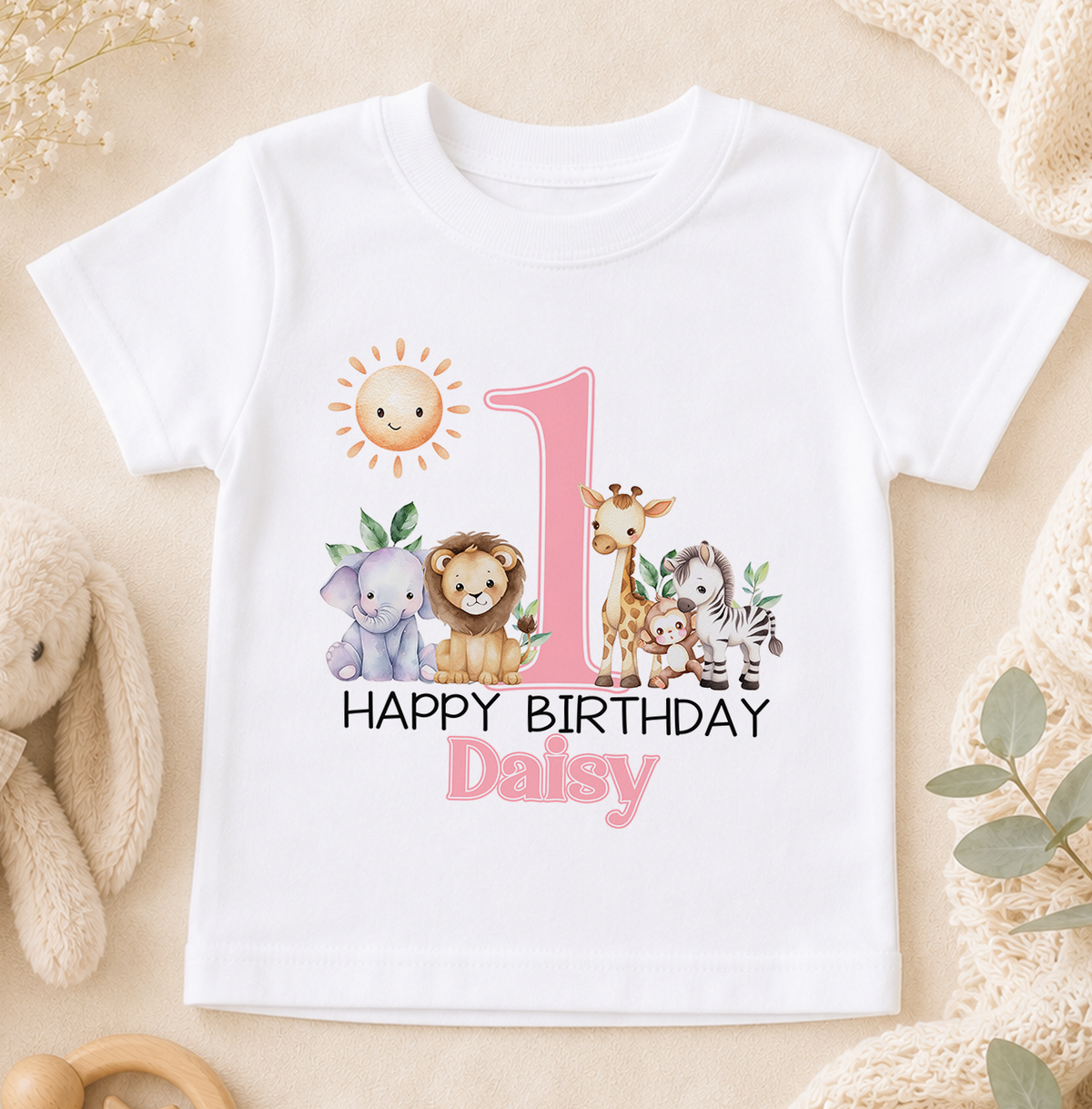 Personalised white t-shirt printed with a sun, giraffe, elephant and lion and 'Happy Birthday Daisy'.