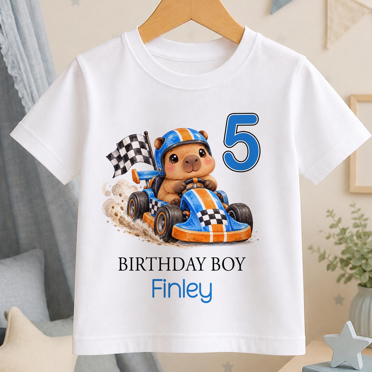 Personalised race car birthday t-shirt – white tee with a capybara in an orange go-kart, chequered flag, blue number 5, Birthday Boy and the name Finley