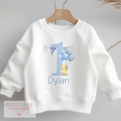 Personalised blue balloon duck first birthday sweatshirt in size 6-12 months with custom baby name