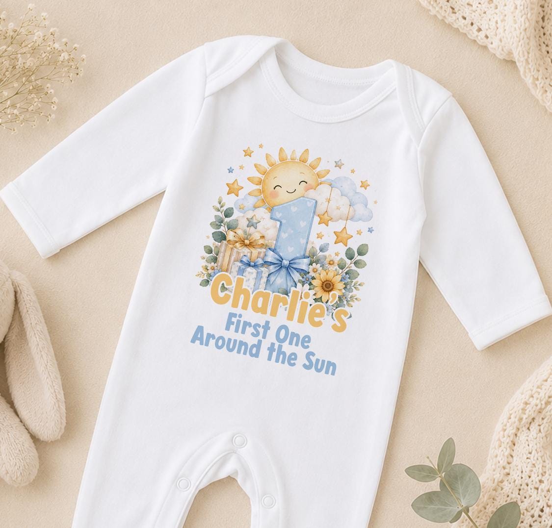 Personalised First One Around the Sun first birthday sleepsuit with the name Charlie