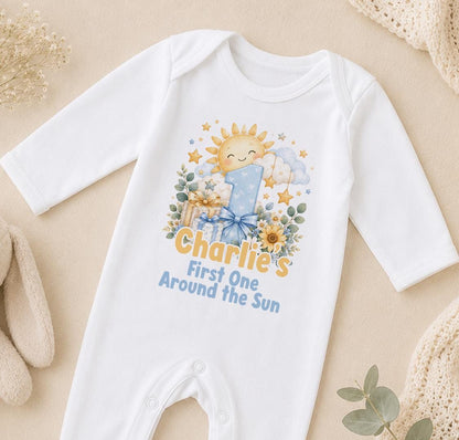 Personalised First One Around the Sun first birthday sleepsuit with the name Charlie
