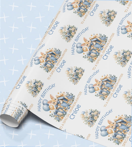 Personalised birthday wrapping paper in blue with bunny rabbits, balloons and flowers, Happy Birthday with a relation and name
