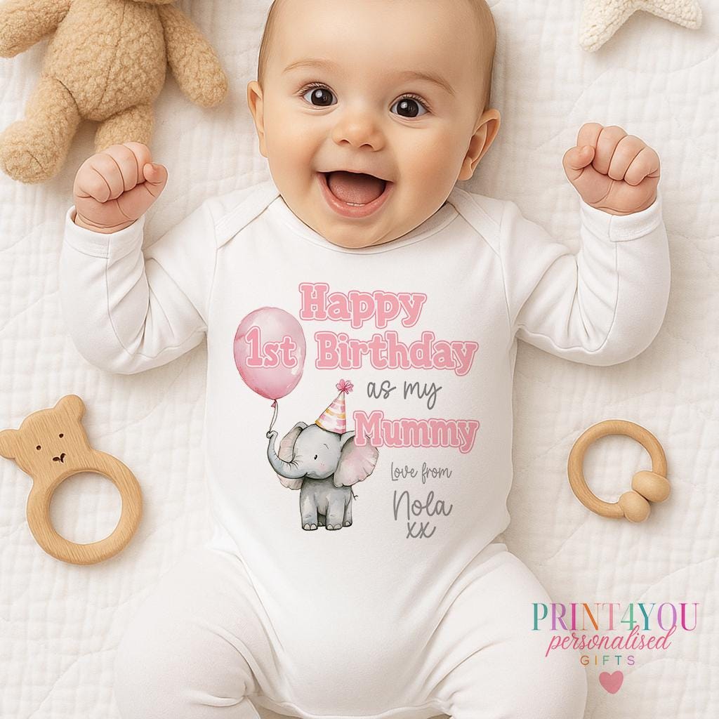 Close-up of the personalised cute elephant design showing the party hat and pink balloon.