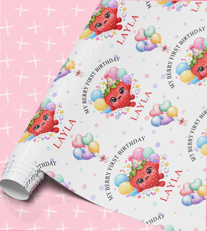 Personalised My Berry First Birthday wrapping paper roll – strawberry in a party hat with pastel balloons and the name Layla