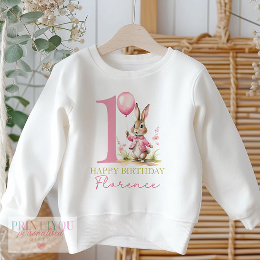 Personalised Flossy Bunny first birthday sweatshirt for baby girls, size 6-12 months