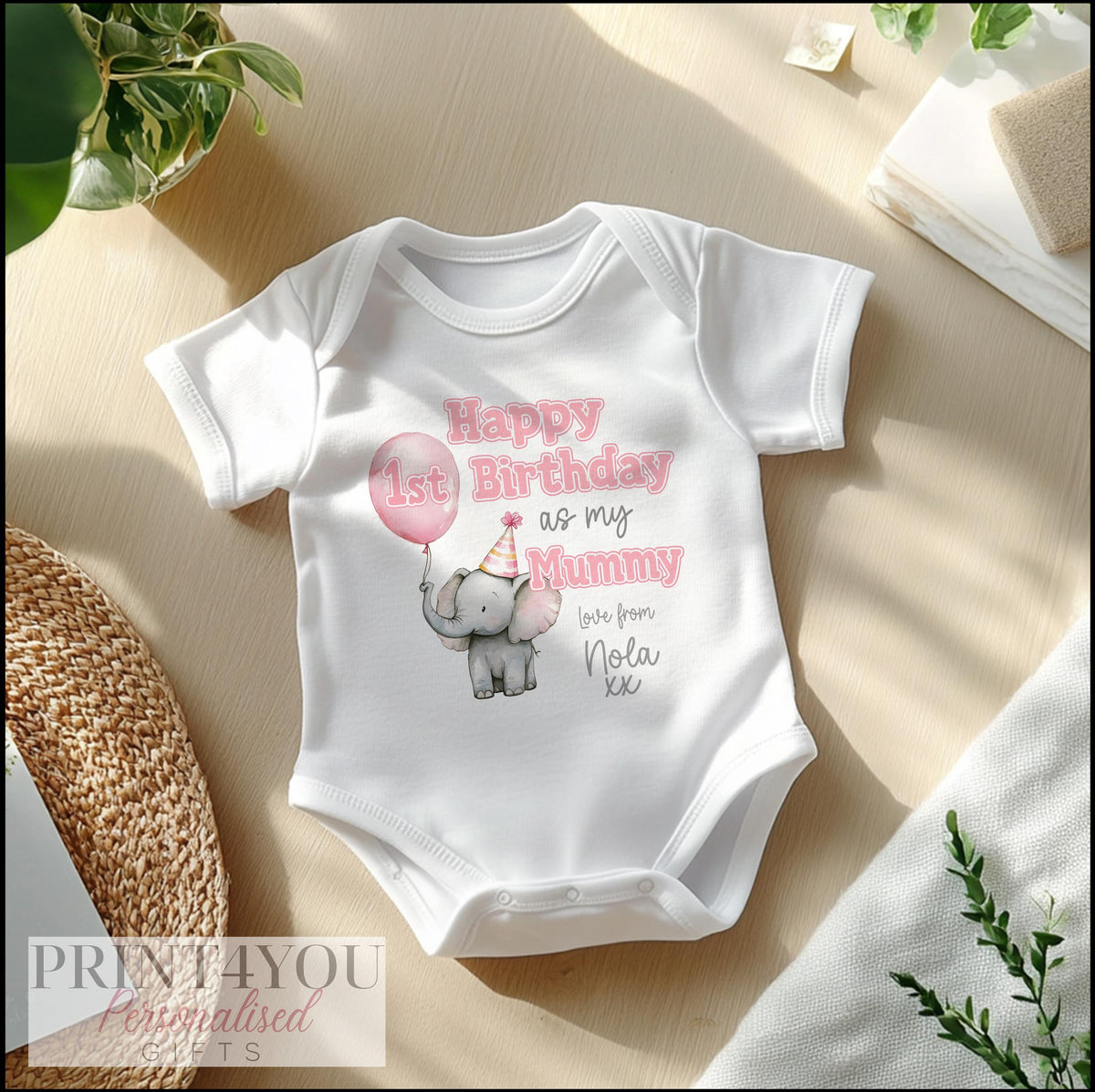 Personalised cute elephant vest printed with 'Happy 1st Birthday' and your baby's name.