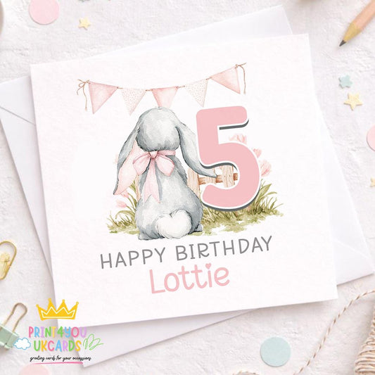 Square personalised birthday card featuring a bunny illustration and pastel bunting, with space for a child's name and age
