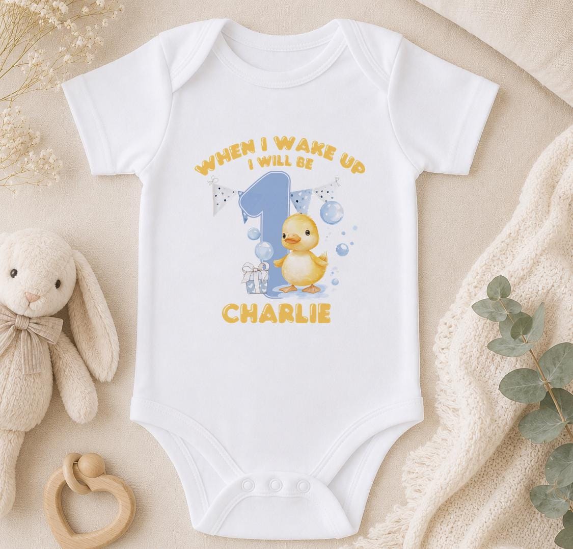 Personalised When I Wake Up I Will Be 1 baby vest with a duckling and the name Charlie