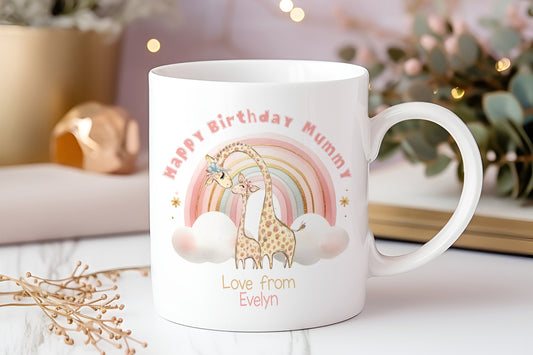 Personalised first birthday as mummy ceramic mug with pink and blue rainbow design, plain white handle