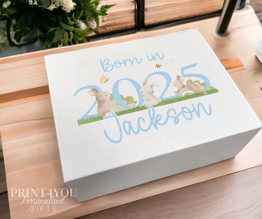 Personalised baby's first birthday keepsake box, sturdy white card with bunny rabbit design and blue text, medium size