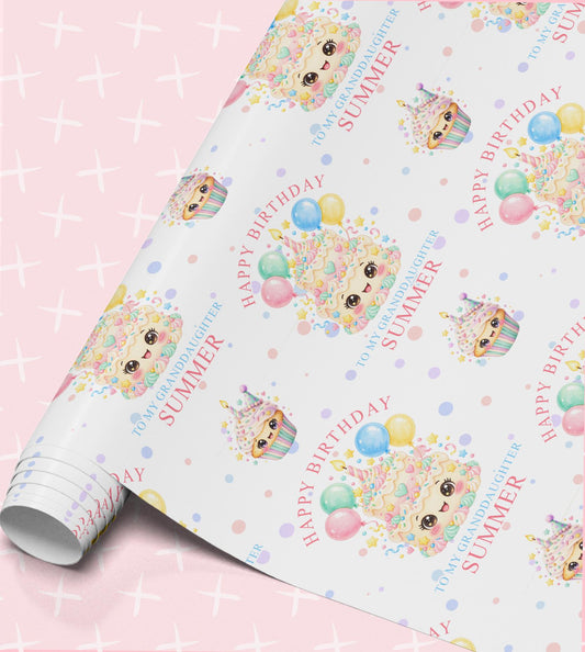 Personalised birthday wrapping paper with a kawaii sprinkle cake and cupcakes in party hats with pastel balloons, printed with Happy Birthday, To My Granddaughter and the name Summer on a pink sparkle background
