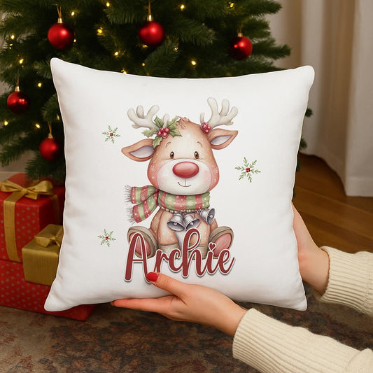 Personalised Reindeer Christmas cushion cover with custom name, reindeer in a striped scarf with holly design