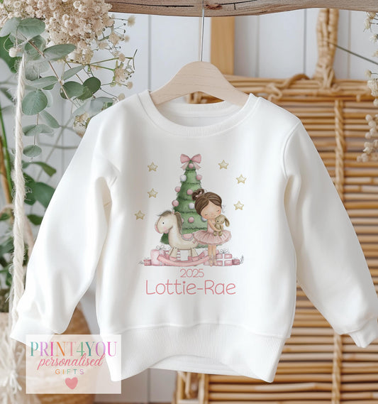 Personalised Christmas ballerina jumper for girls in soft pastel print design 1, shown in 6-12 months size