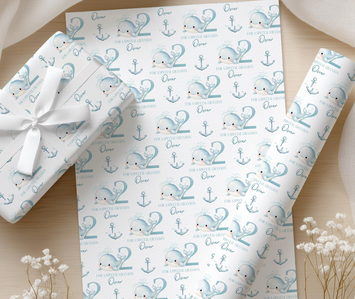 Personalised whale wrapping paper wrapped around a birthday gift box