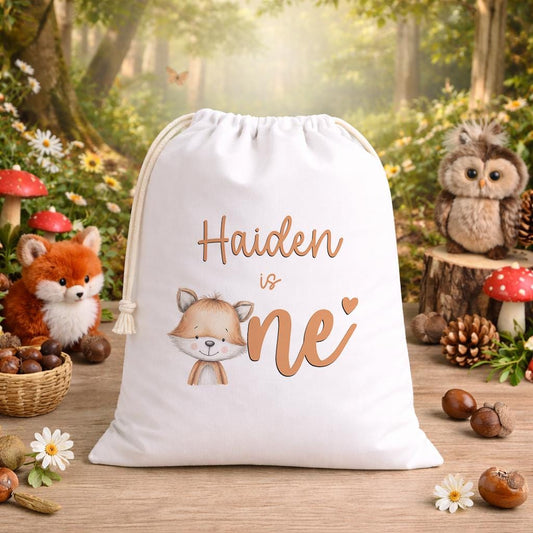 Personalised woodland birthday sack laid flat, showing the fox design and printed name