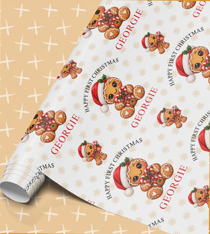 Personalised Happy First Christmas wrapping paper roll – gingerbread in a Santa hat with a candy cane and the name Georgie