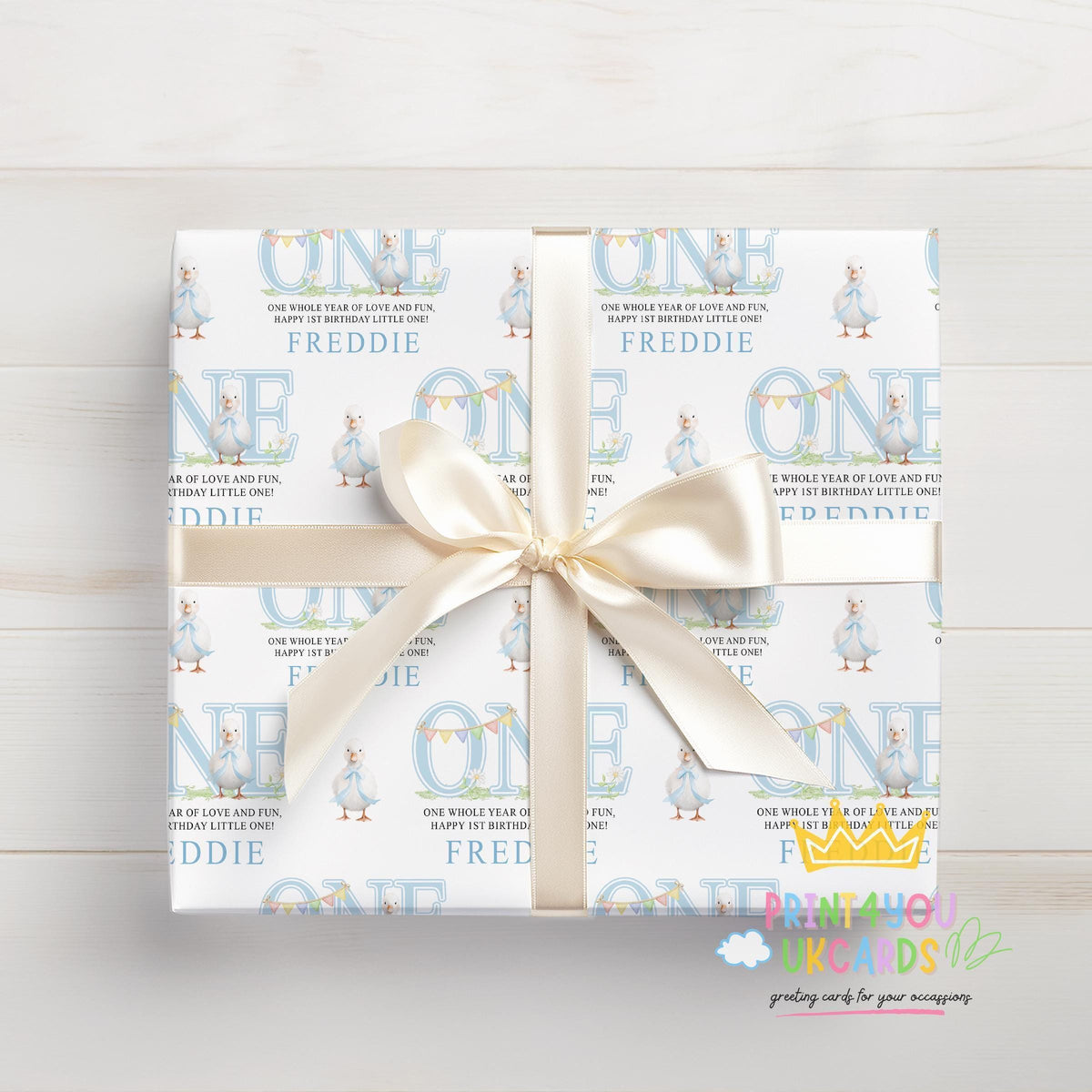 Roll of the personalised blue duck wrapping paper packaged ready for postal delivery.