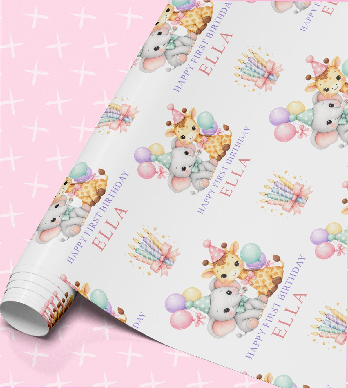 Personalised first birthday wrapping paper roll with a giraffe and elephant in party hats, pastel balloons, candles and the name Ella with Happy First Birthday