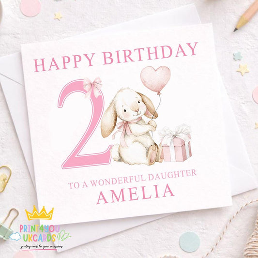 Pink square birthday card with a bunny design, personalised with a child's name and age