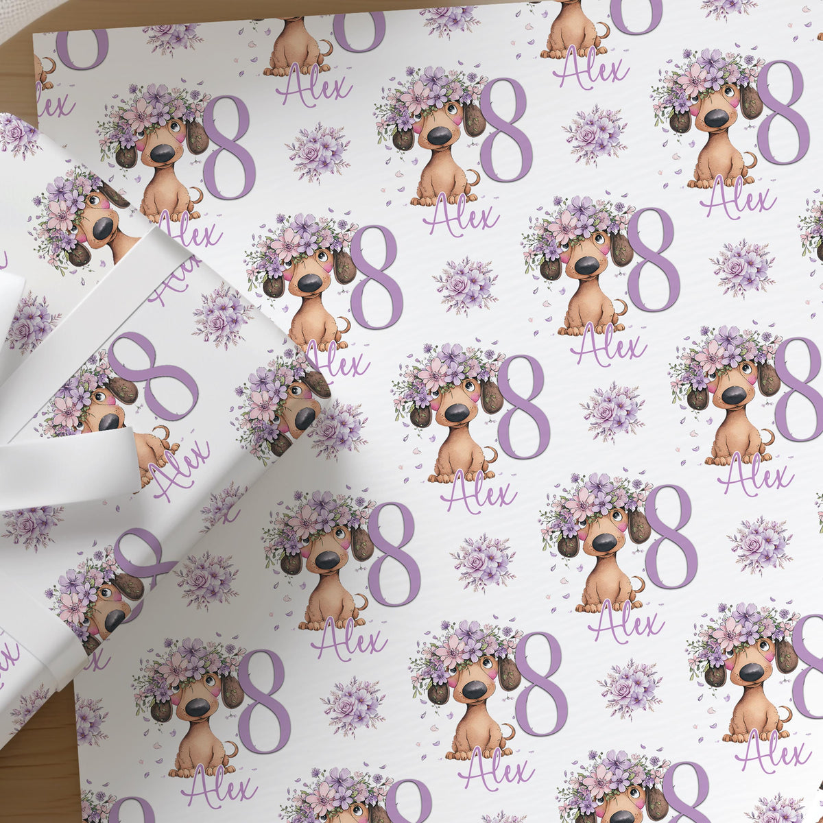 Repeating pattern of dachshund sausage dogs on personalised birthday wrapping paper