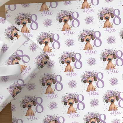 Repeating pattern of dachshund sausage dogs on personalised birthday wrapping paper