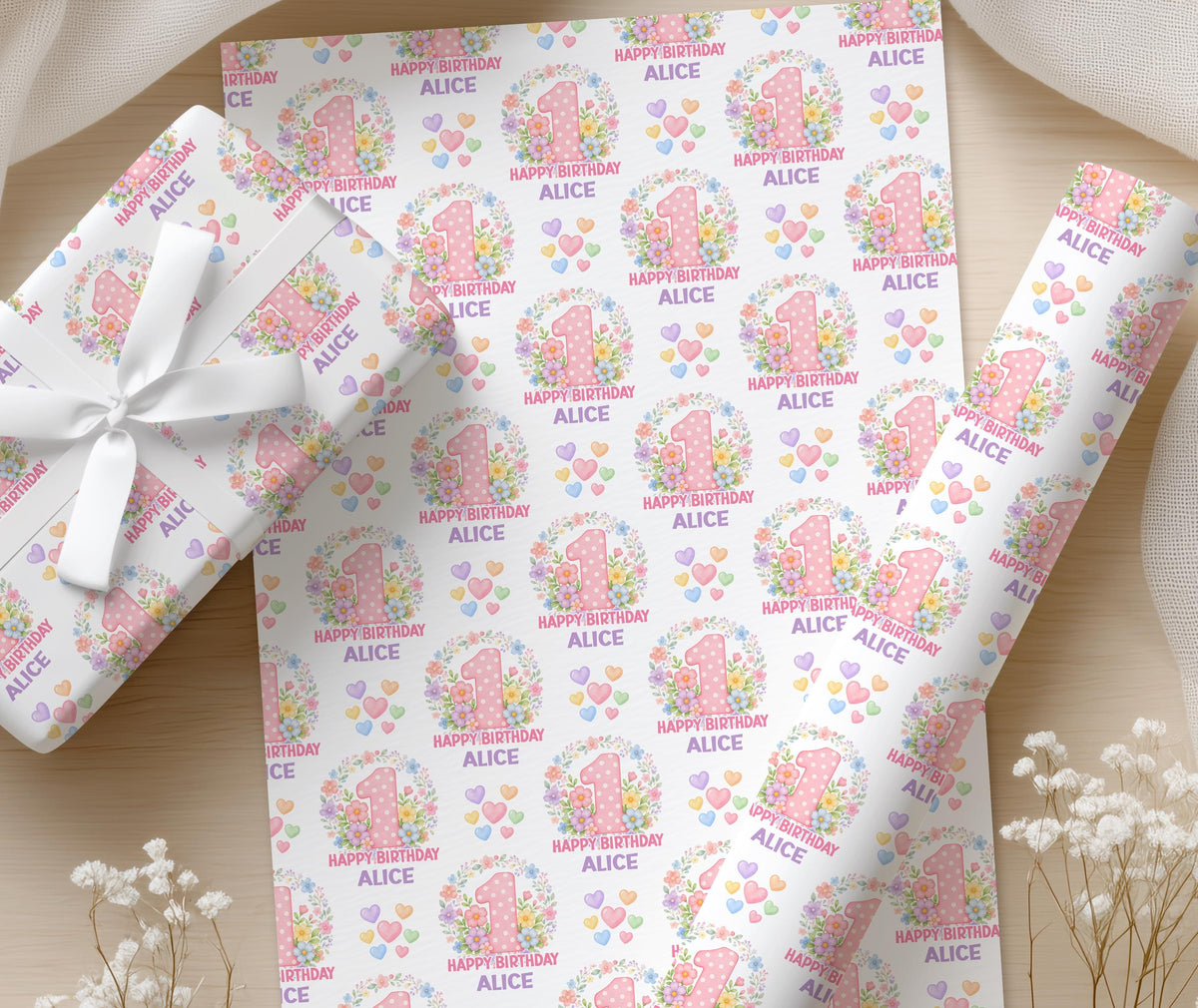 Roll of personalised blossom number wrapping paper packaged in a postal tube ready for delivery.