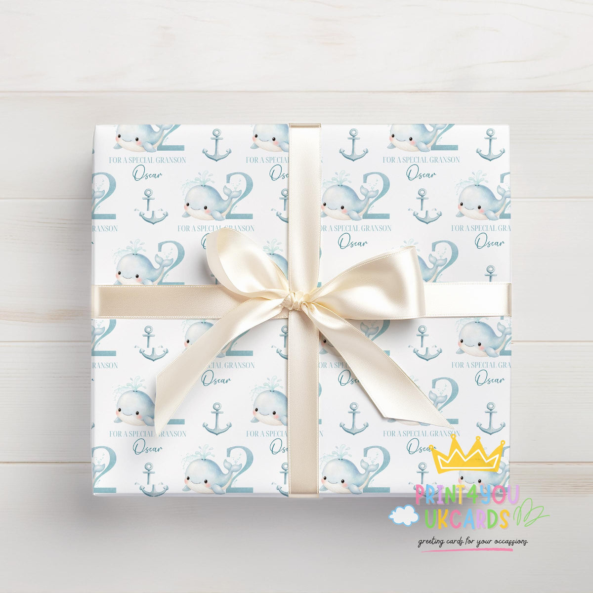 Personalised whale wrapping paper sheet laid flat showing the full pattern