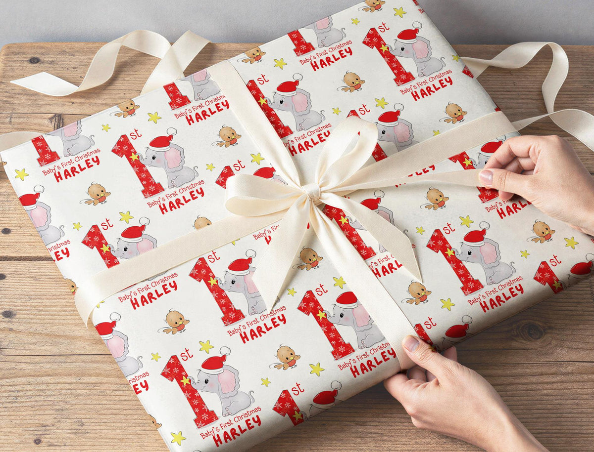 Personalised elephant Christmas wrapping paper showing the repeating festive pattern