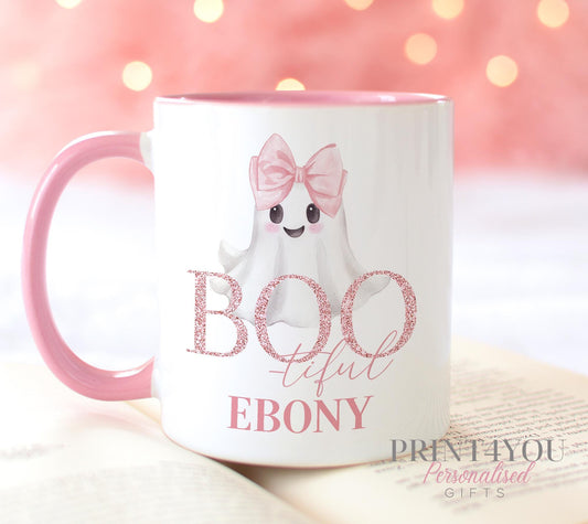 Pink handled ceramic mug with a glitter BOOtiful ghost design wearing a pink bow, personalised with a custom name