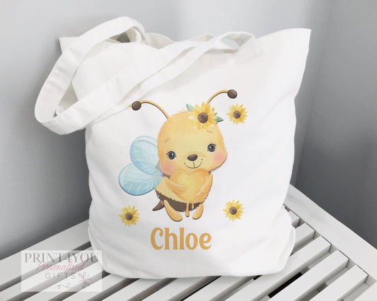 White cotton tote bag printed with a Highland cow design, non-personalised shopper