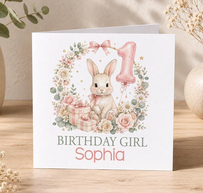 Personalised bunny 1st birthday card – bunny in a pink rose wreath with a number 1 balloon and Birthday Girl Sophia