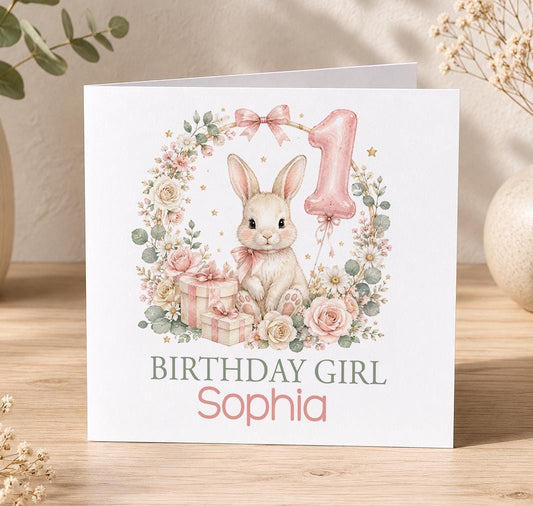 Personalised bunny 1st birthday card – bunny in a pink rose wreath with a number 1 balloon and Birthday Girl Sophia