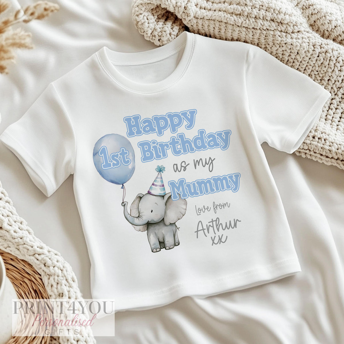 Personalised birthday vest with a cute elephant holding a blue balloon design and custom name.