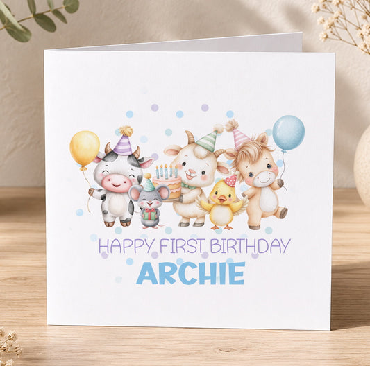First birthday keepsake card featuring cartoon farm animals – a cow, pig, chicken and duck – with balloons and the personalised message 'Happy First Birthday Archie'.