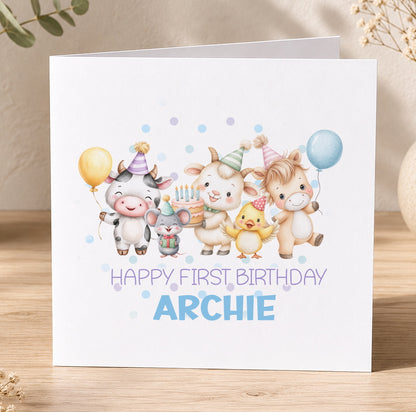 Square 1st birthday card featuring farmyard animals including a cow, pig, chicken and duck with balloons, personalised for a son's first birthday.