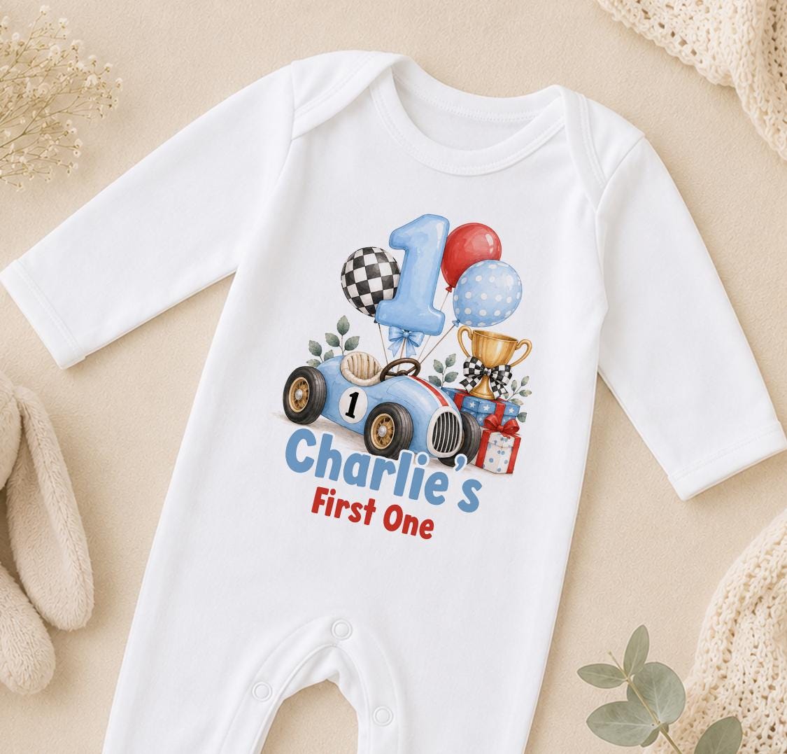 Personalised race car first birthday sleepsuit with number 1 and Charlie's First One