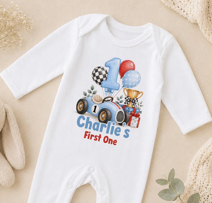 Personalised race car first birthday sleepsuit with number 1 and Charlie's First One