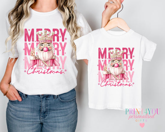 Baby wearing a mummy and me Christmas t-shirt with printed on the front, 0-3 months