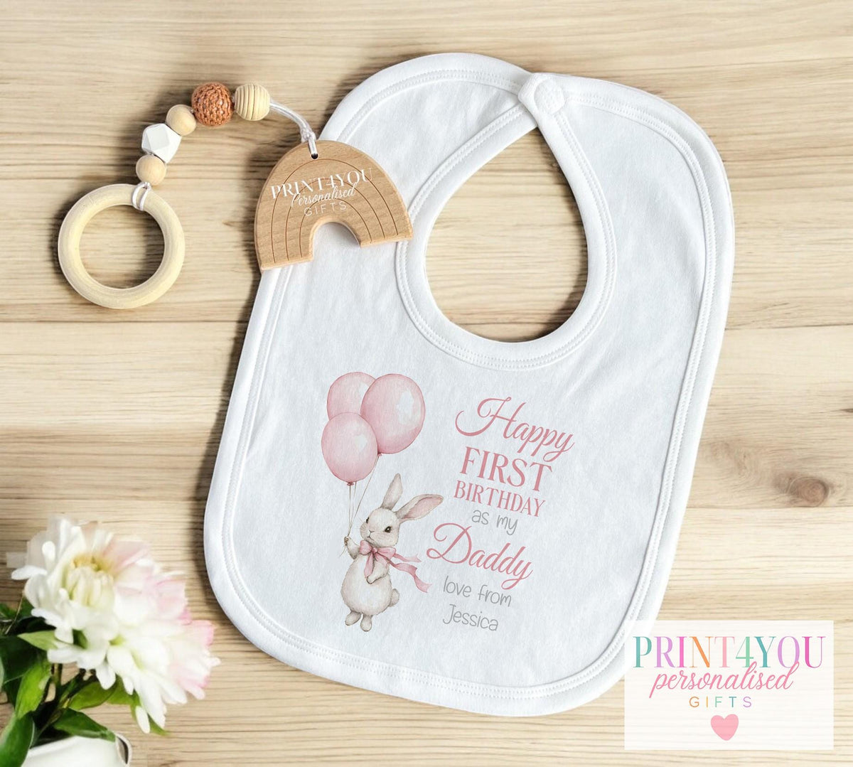 Personalised pink bunny 1st birthday t-shirt, printed with baby's name and family title.