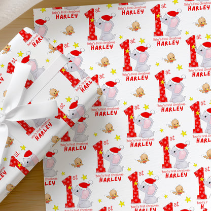 Personalised Baby's First Christmas elephant wrapping paper shown as a full sheet