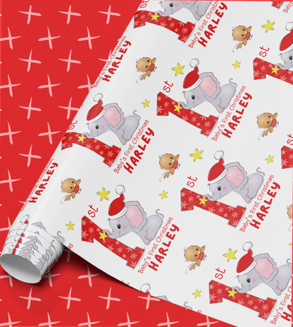 Close-up of the personalised elephant Baby's First Christmas wrapping paper design