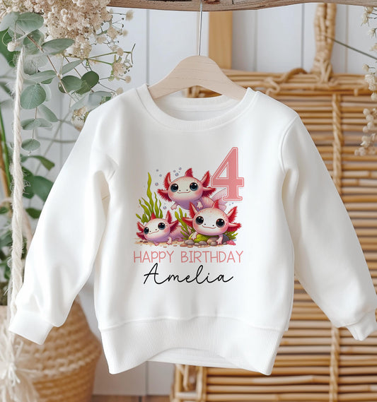 Personalised white cotton sweatshirt with cute axolotl design, custom name and birthday age, baby size 6-12 months